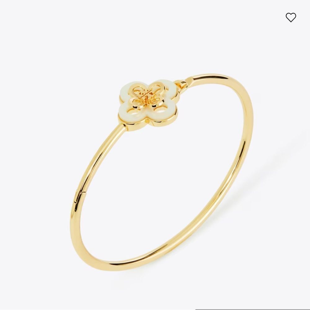 Tory Burch Kira Clover Hinge Bracelet with a mother of pearl clover charm